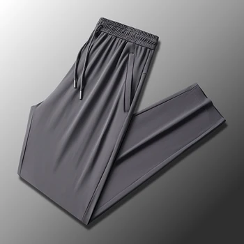 Новые мужские летние Тонкие эластичные спортивные повседневные брюки Ice Silk с 9 точками, удобная свободная посадка, быстросохнущие брюки с кондиционером.